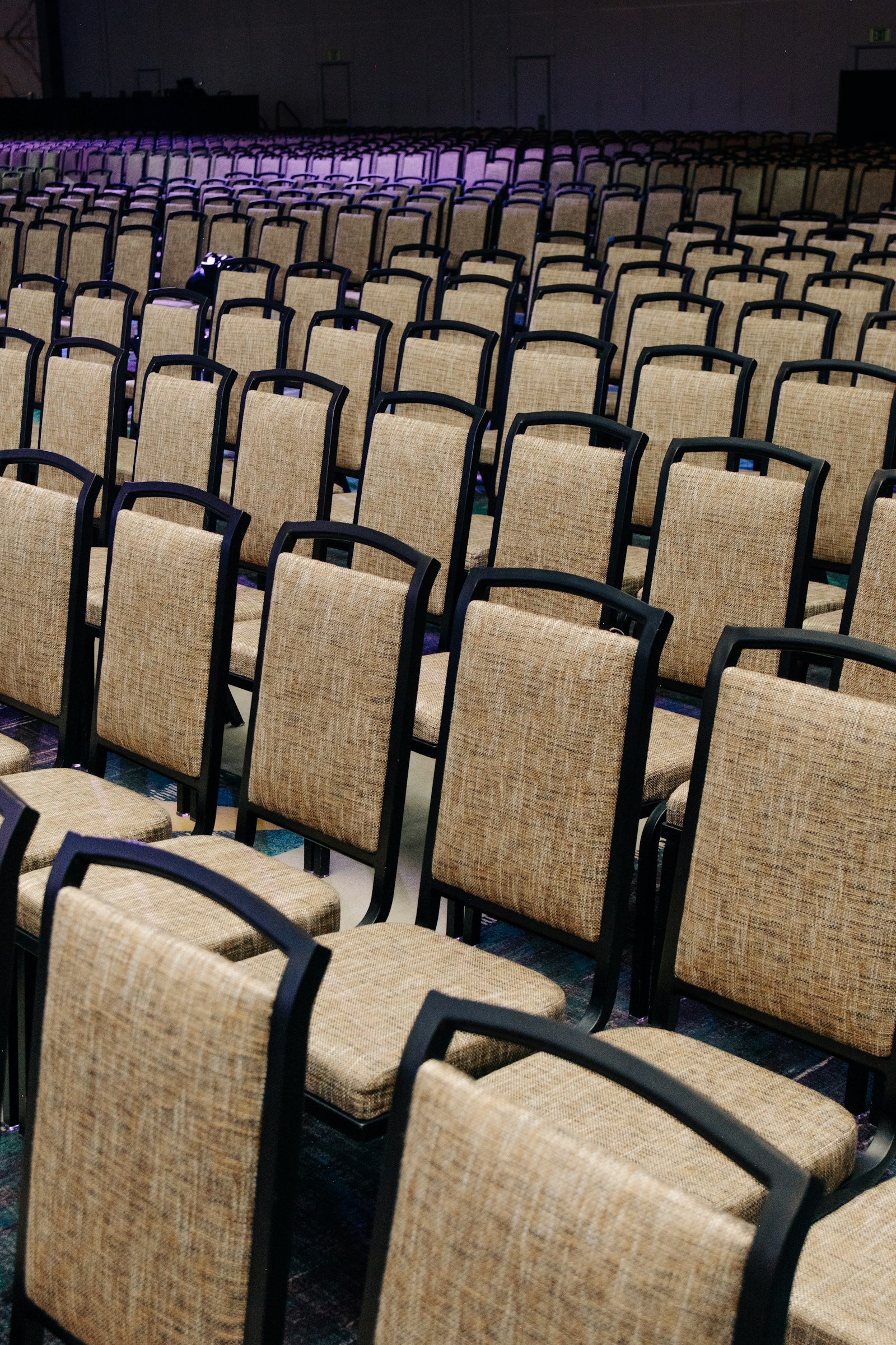 Rows of seats in an event hall showing venue capacity